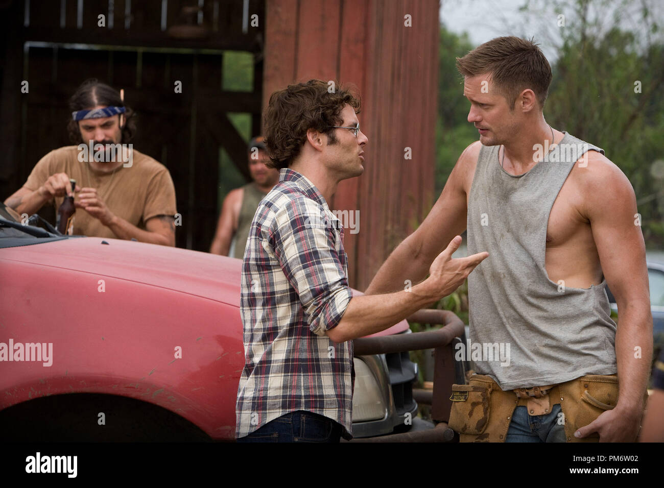 (L à R) Rhys Coiro comme 'Norman', James Marsden comme 'David' Sumner et Alexander Skarsgard comme 'Charlie' dans Screen Gems' LES CHIENS DE PAILLE. Banque D'Images