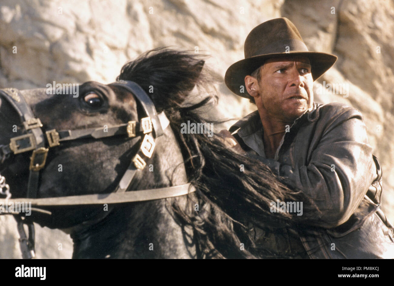 Photo du film ou encore la publicité de "Indiana Jones et la Dernière Croisade" Harrison Ford © 1989 Lucasfilm Tous Droits Réservés #  de référence fichier 31623101THA pour un usage éditorial uniquement Banque D'Images