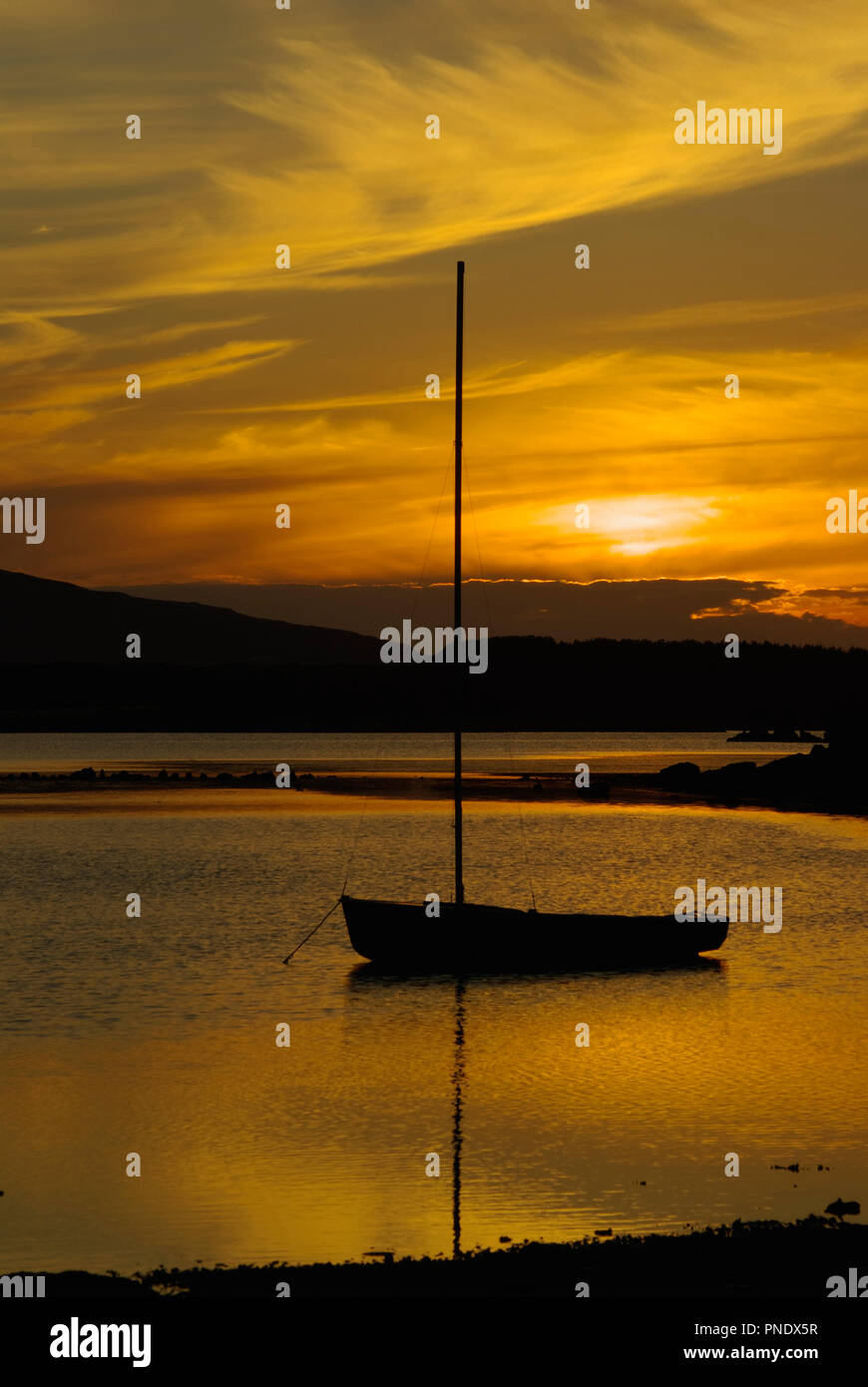 Coucher de soleil sur four Mile Bridge Anglesey Banque D'Images