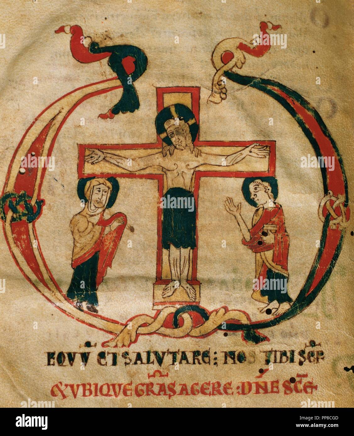 D'époque romane. Le Codice. Parvum missale. ca. 1075-1100. Minuscule Caroline sript. Initeal historiée : la crucifixion. De Gérone. Musée épiscopal de Vic. La Catalogne, Espagne. Banque D'Images