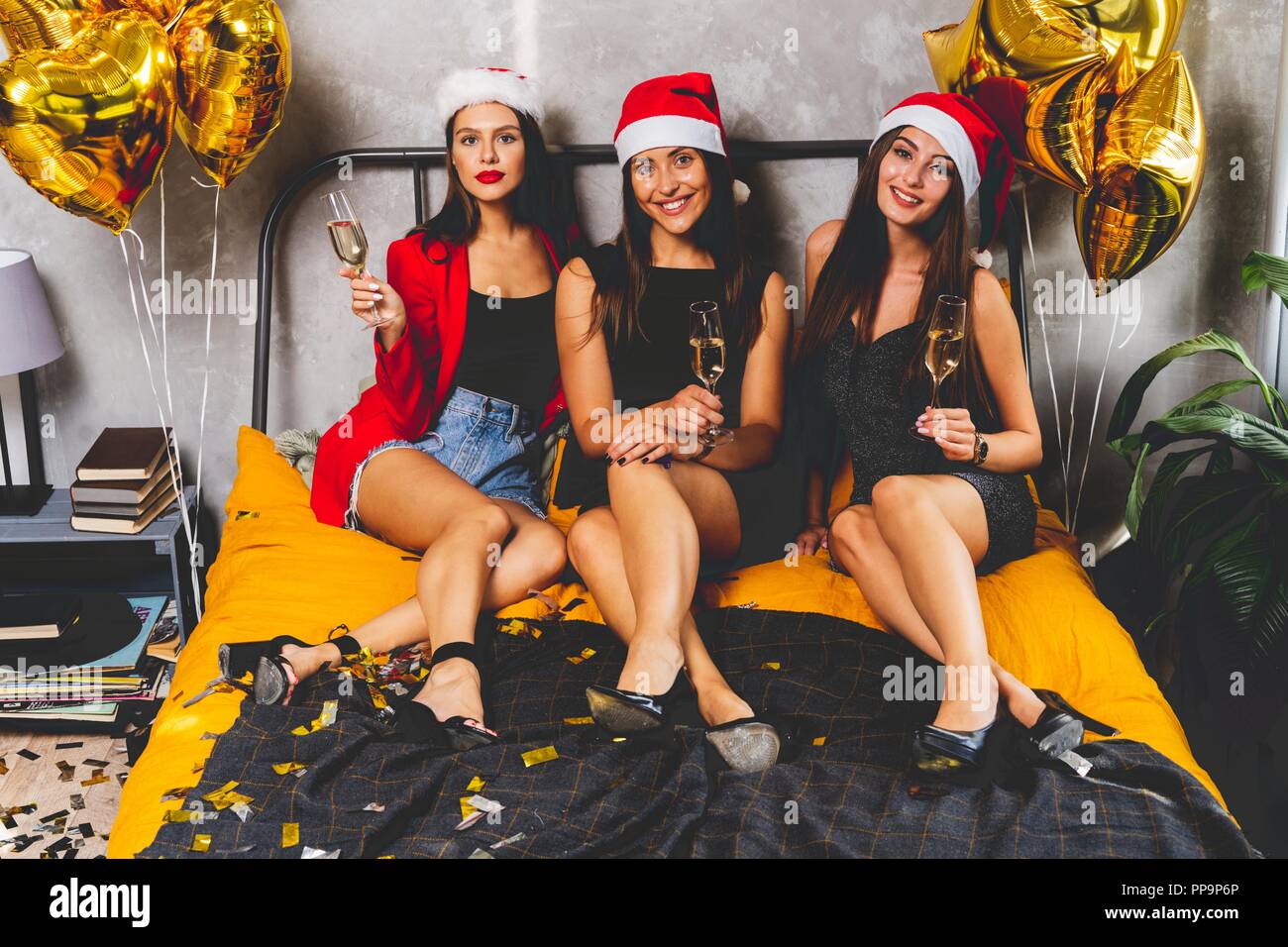 Trois belles filles sur le Nouvel An Banque D'Images