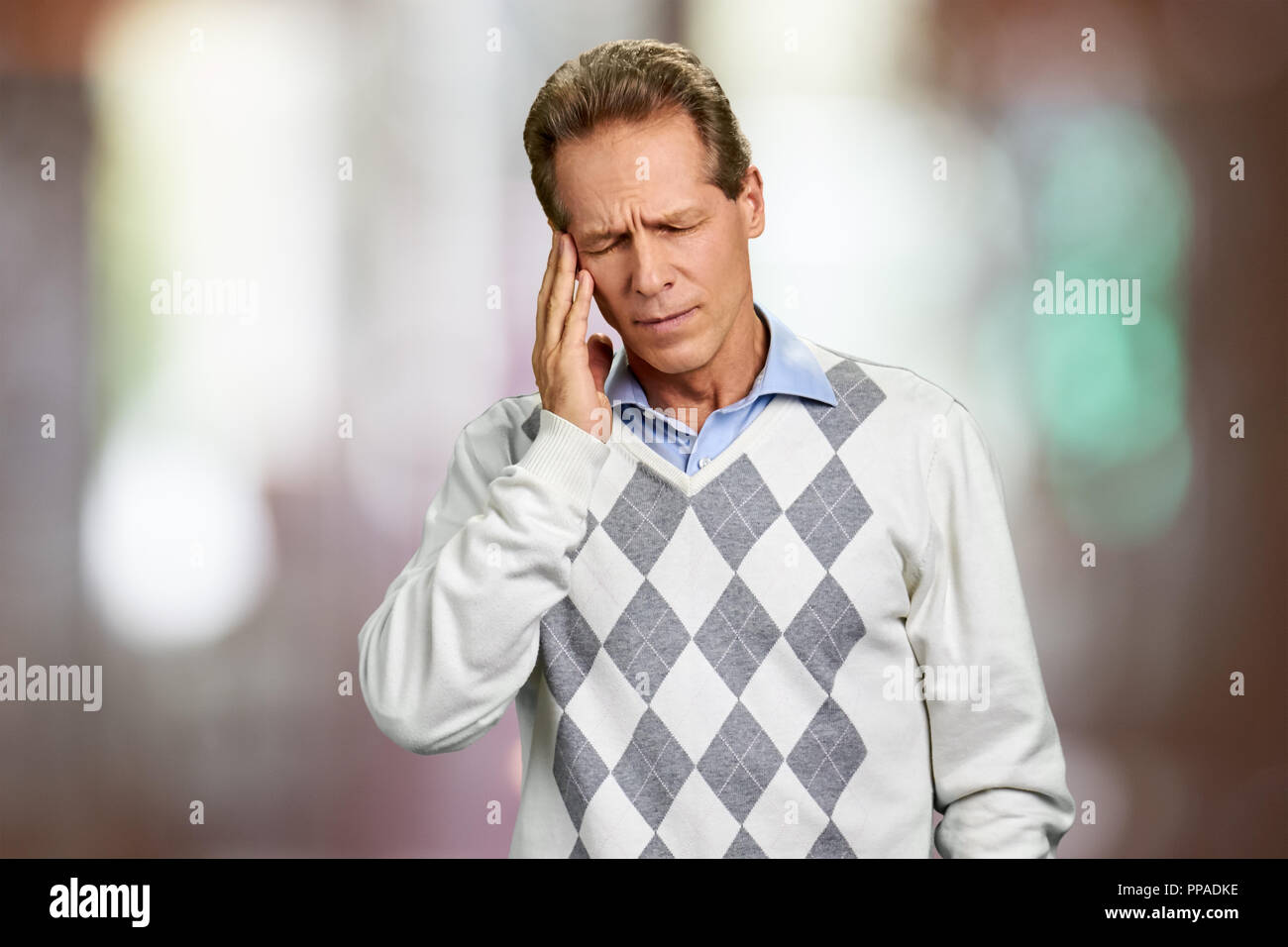 Homme mûr souffrant de migraine. Banque D'Images
