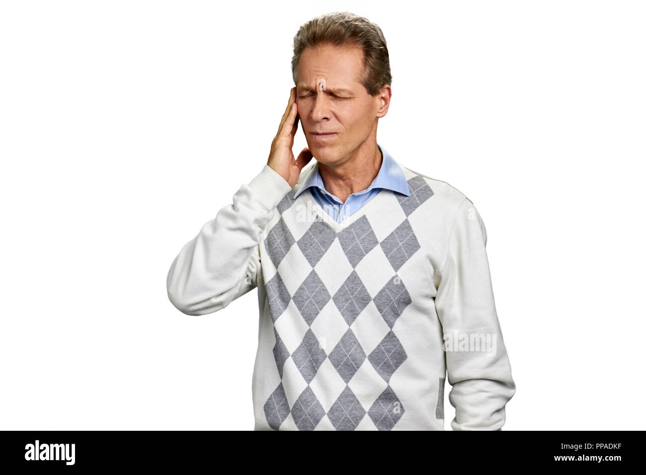 Homme d'âge moyen souffrant de migraine. Banque D'Images