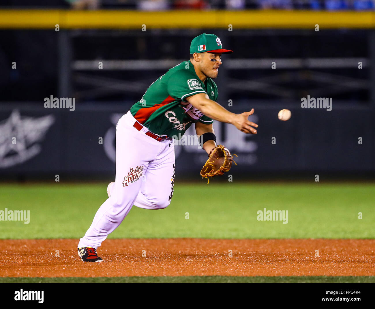 Les actions de la série des Caraïbes d'un match de baseball avec le match de Tomateros de Culiacán de Mexico contre les Criollos de Caguas de Porto Rico en baseb Banque D'Images