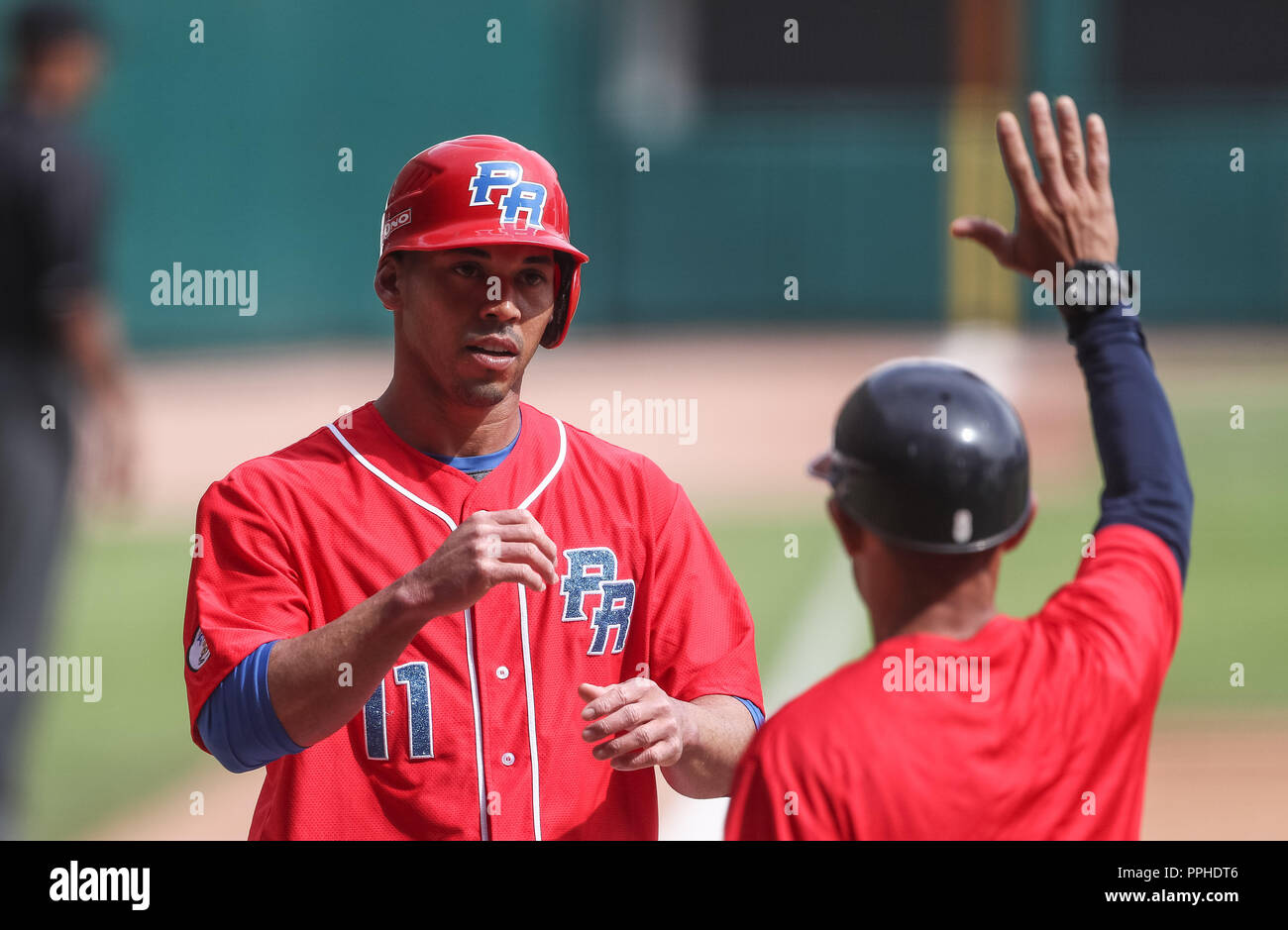 Ivan de Jésus de Puerto Rico celebra carrera, durante el partido de beisbol de la Serie del Caribe entre Republica Dominicana vs Porto Rico en el nue Banque D'Images