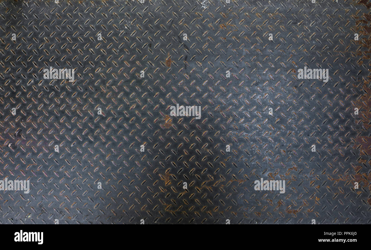 Sale et de l'acier utilisé checker plate feuille de métal. Peut être utiliser comme arrière-plan ou la texture. Banque D'Images