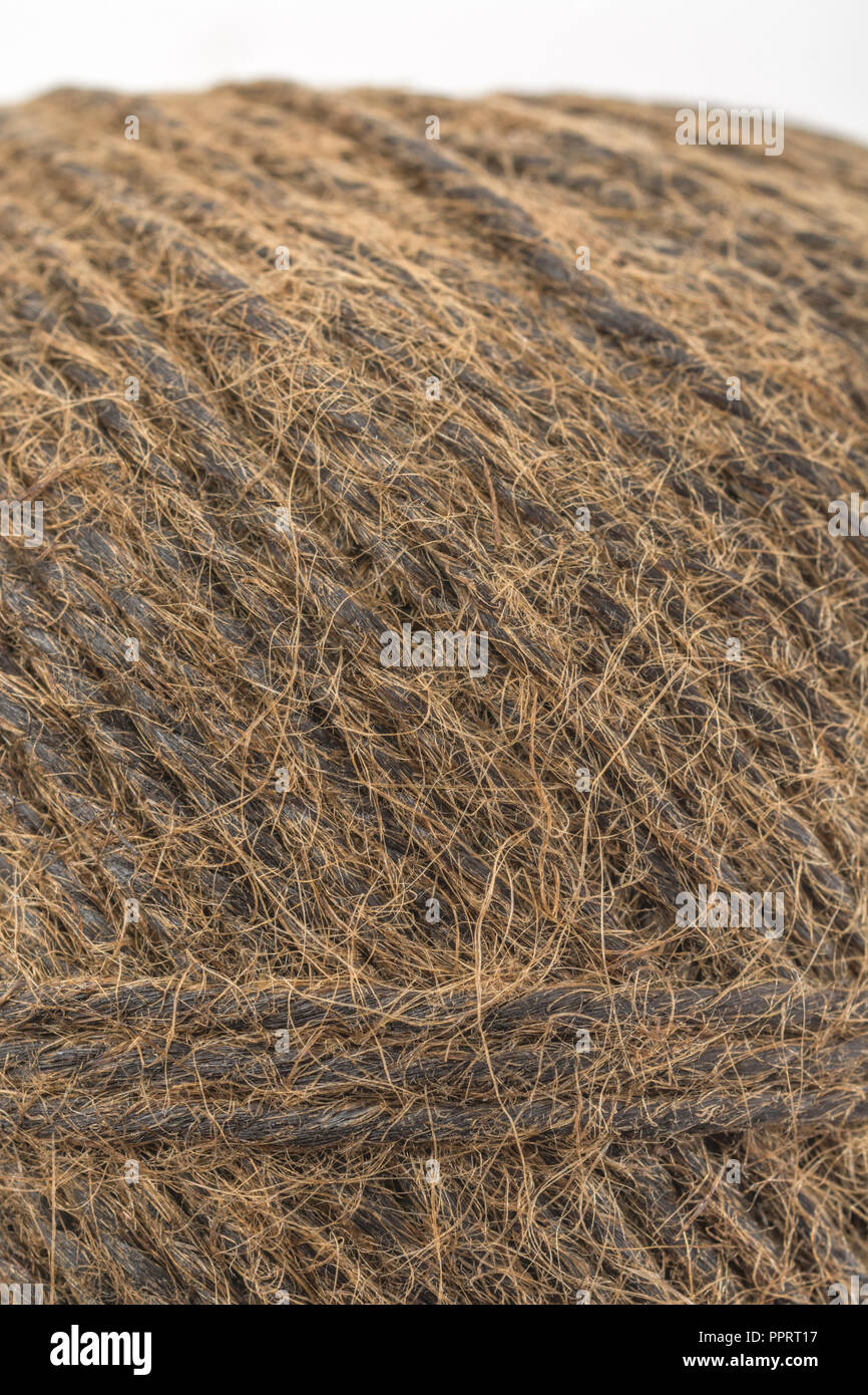 Jardin naturel fibre de sisal ficelle goudronnée / chaîne. Super macro de fibres individuelles qui composent la ficelle. "Métaphore Quelle est la durée d'un morceau de ficelle ?' Banque D'Images