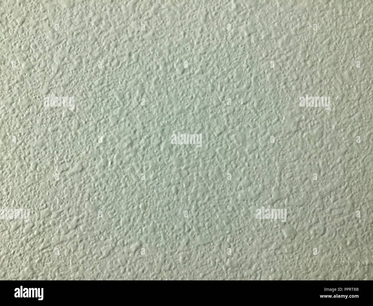 Mur de plâtre blanc avec des textures. Banque D'Images