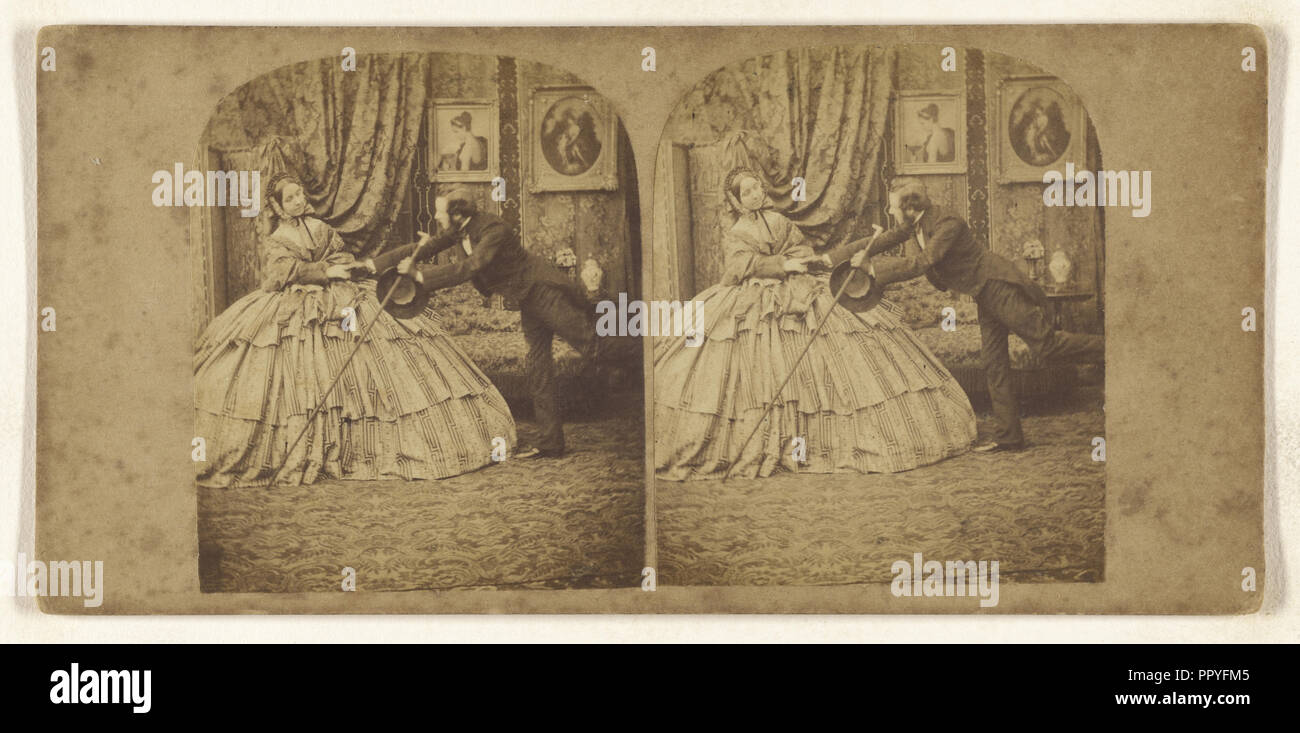 Genre : Homme essayant de tenir la main de femme en robe cerceau ; vers 1865 ; à l'albumine argentique Banque D'Images