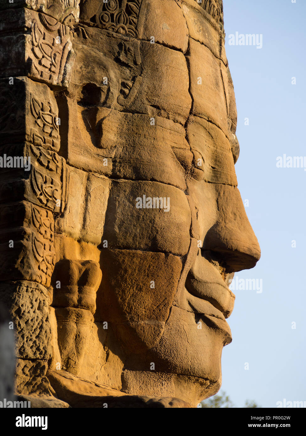 Pierre énorme visage, temple Bayon, Angkor Wat complexe, UNESCO World Heritage Site, près de Siem Reap, Cambodge, Indochine, Asie du Sud-Est, l'Asie Banque D'Images