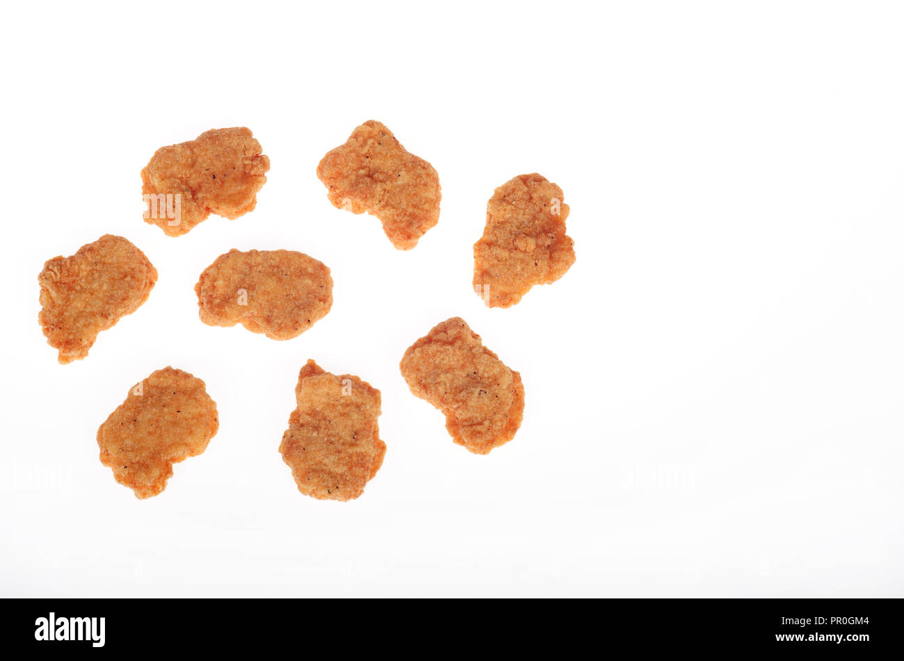 Nuggets de poulet sur fond blanc Banque D'Images