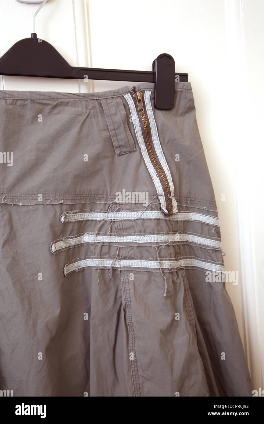 Close Up of Zip sur jupe Kaki Banque D'Images