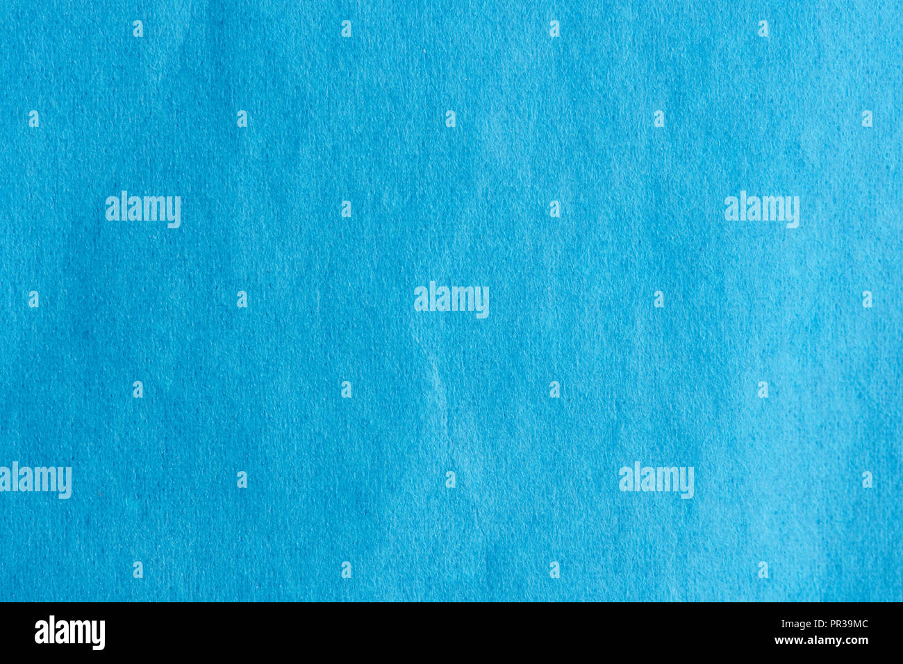 Fond de toile bleu clair de près. La texture de surface de papier Banque D'Images