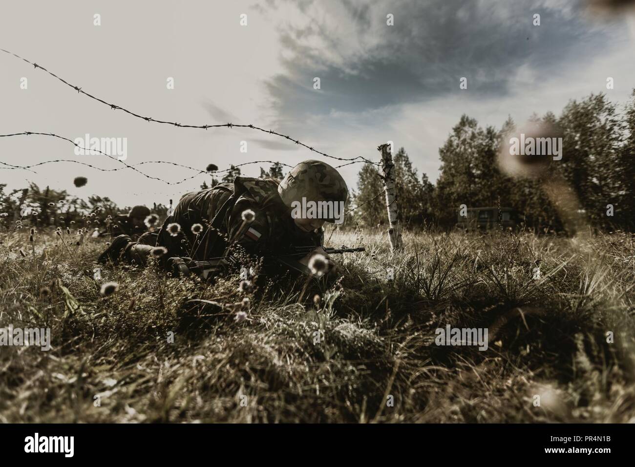 Des soldats polonais affectés à un groupe de combat de la Pologne, de procéder à la formation d'interopérabilité avec l'armée américaine. La Pologne est un groupe de combat, unique coalition multinationale d'États-Unis, Royaume-Uni, soldats roumains et croates qui servent avec la 15e Brigade mécanisée polonaise comme un moyen de dissuasion à l'appui de l'OTAN vers l'amélioration de la présence. Banque D'Images