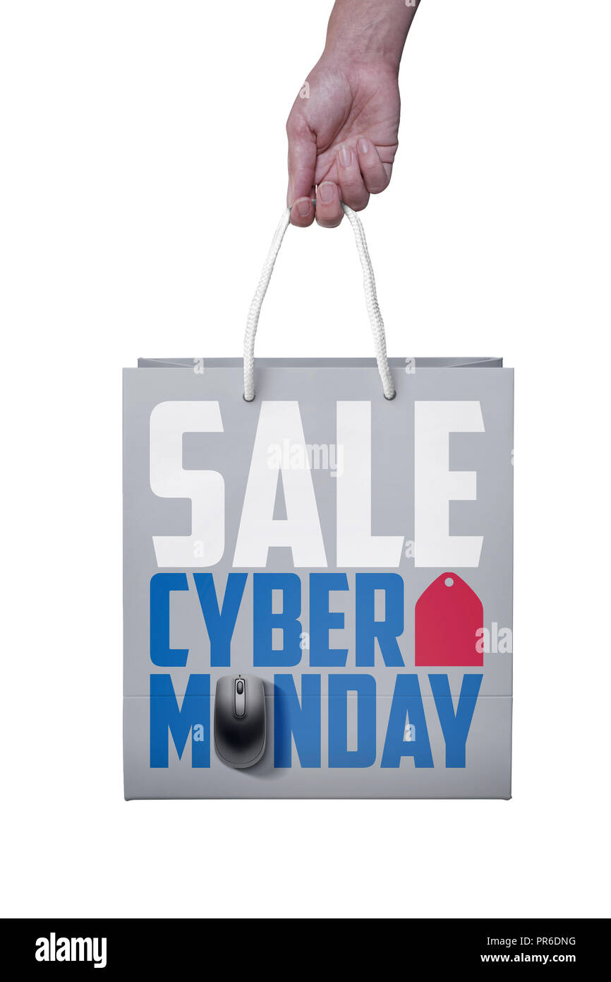 Shopper avec The Paperbag Cyber Monday, PC, ordinateur portable souris. ticket Vente étiquette tag - Magasinage en ligne concept Banque D'Images