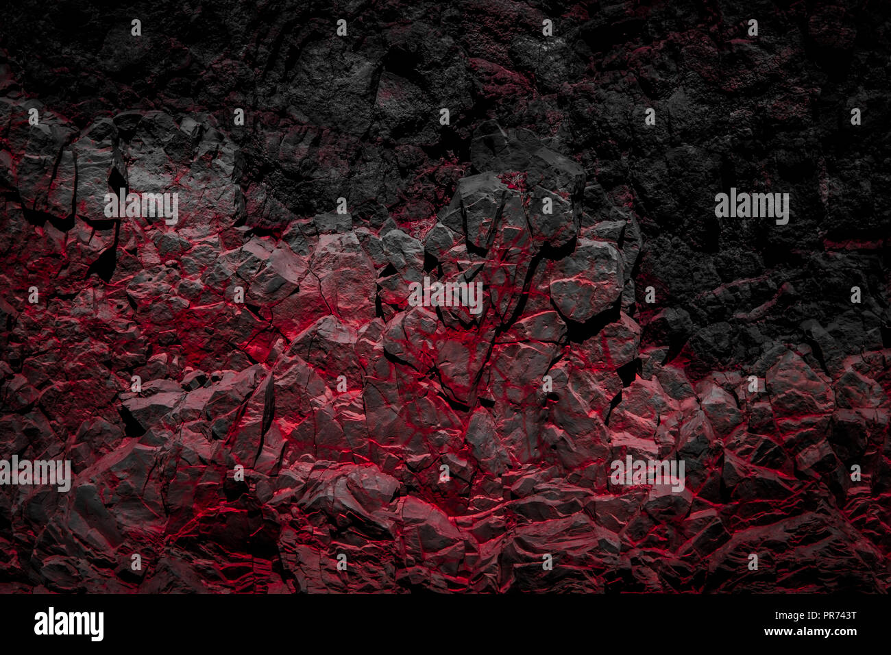 Les roches de couleur rouge et noir / rock wall background - Banque D'Images