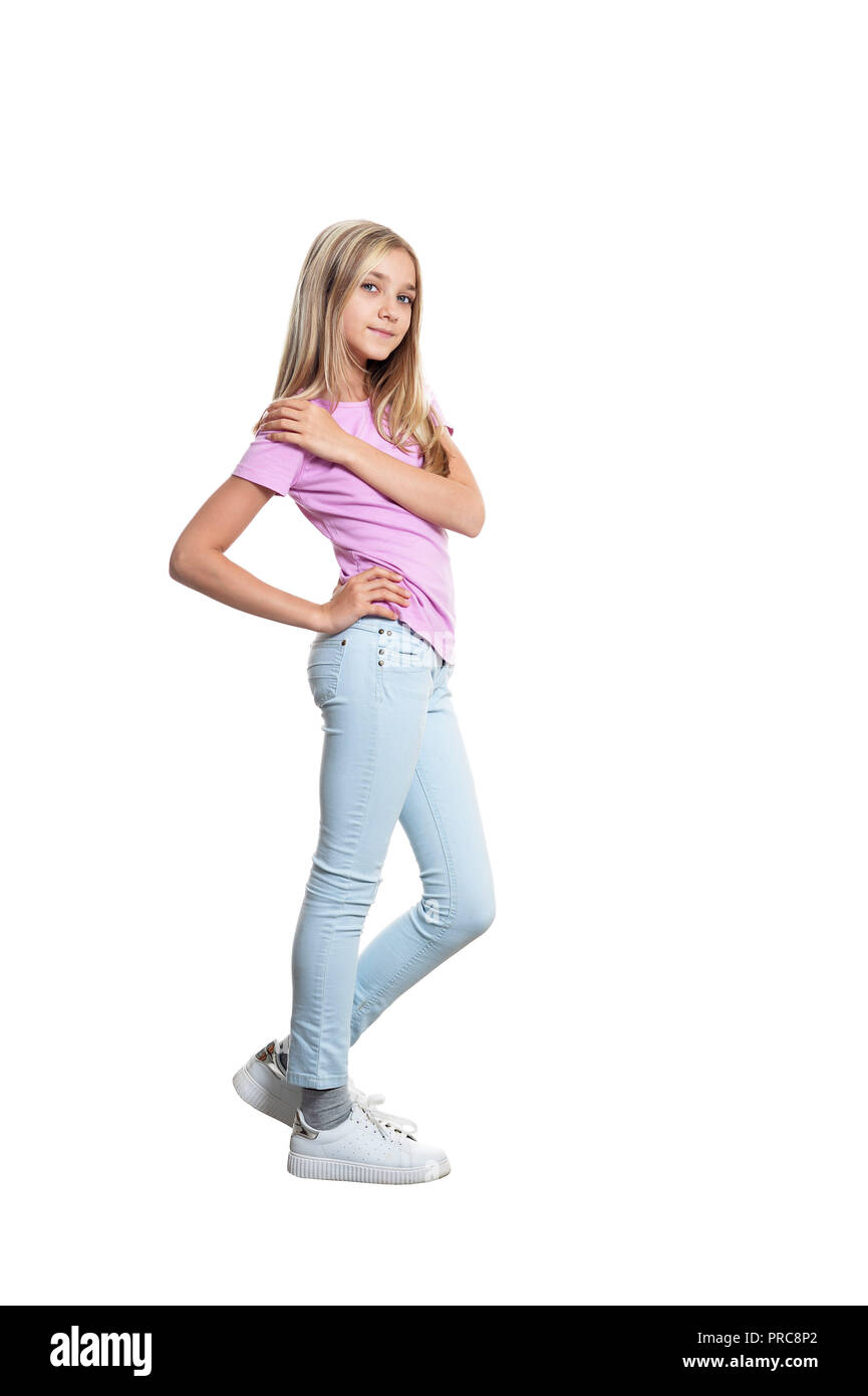 Cute girl in casual clothing posant sur fond blanc Banque D'Images