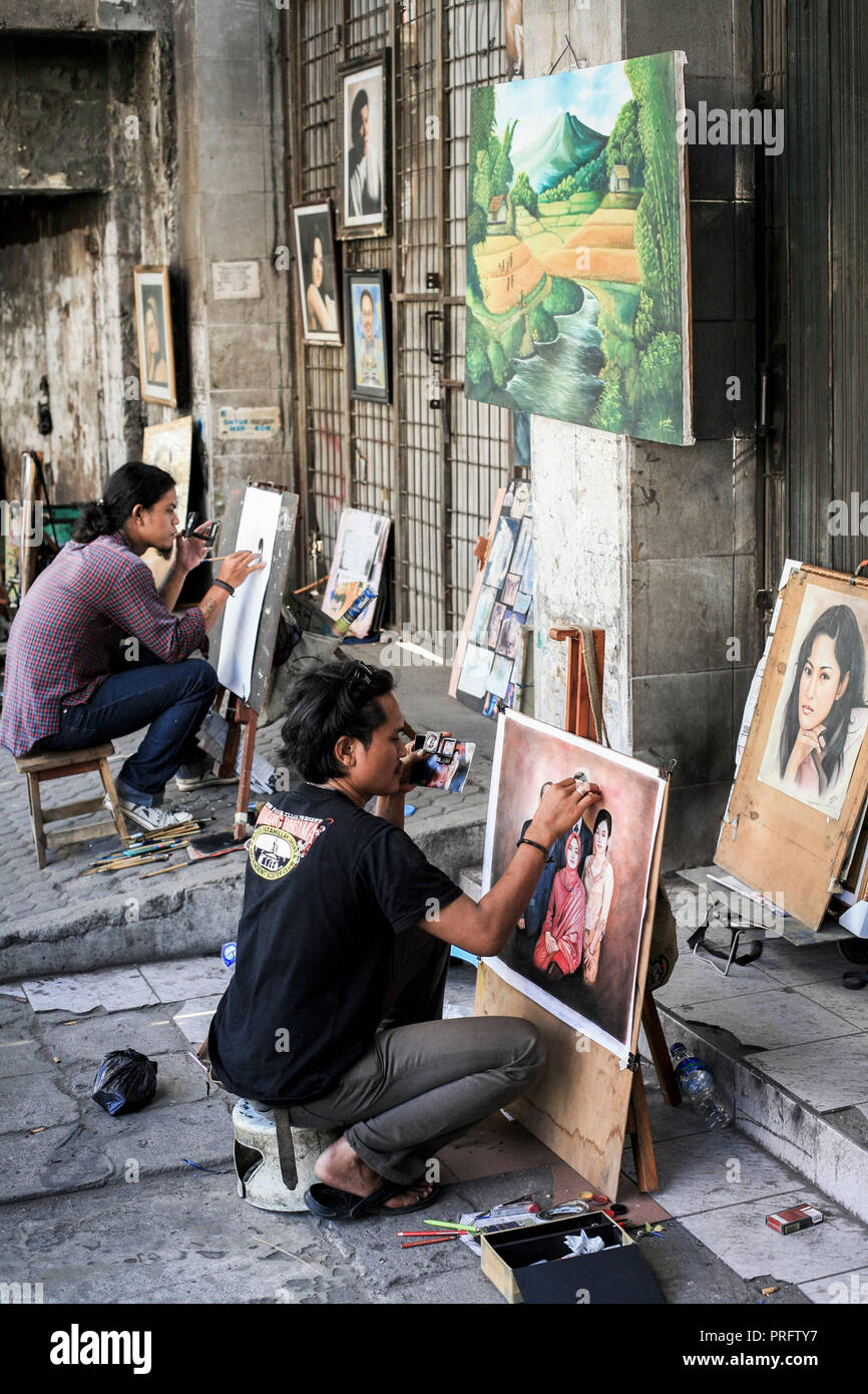 Portraits de peintres au travail dans les rues de la vieille Batavia, Jakarta, Indonésie Banque D'Images