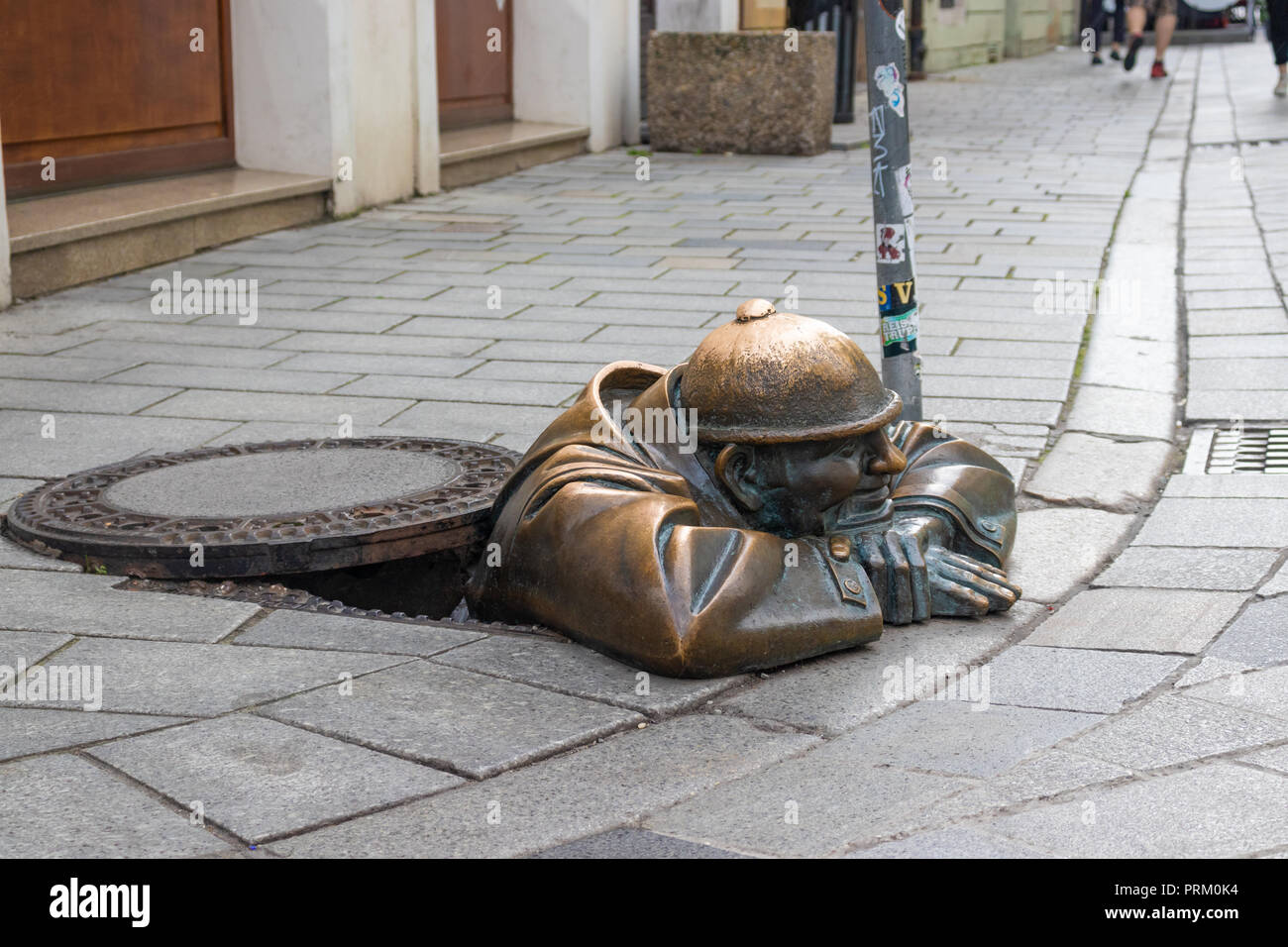 Cumil le travailleur d'égouts statue Bratislava, Slovaquie Banque D'Images