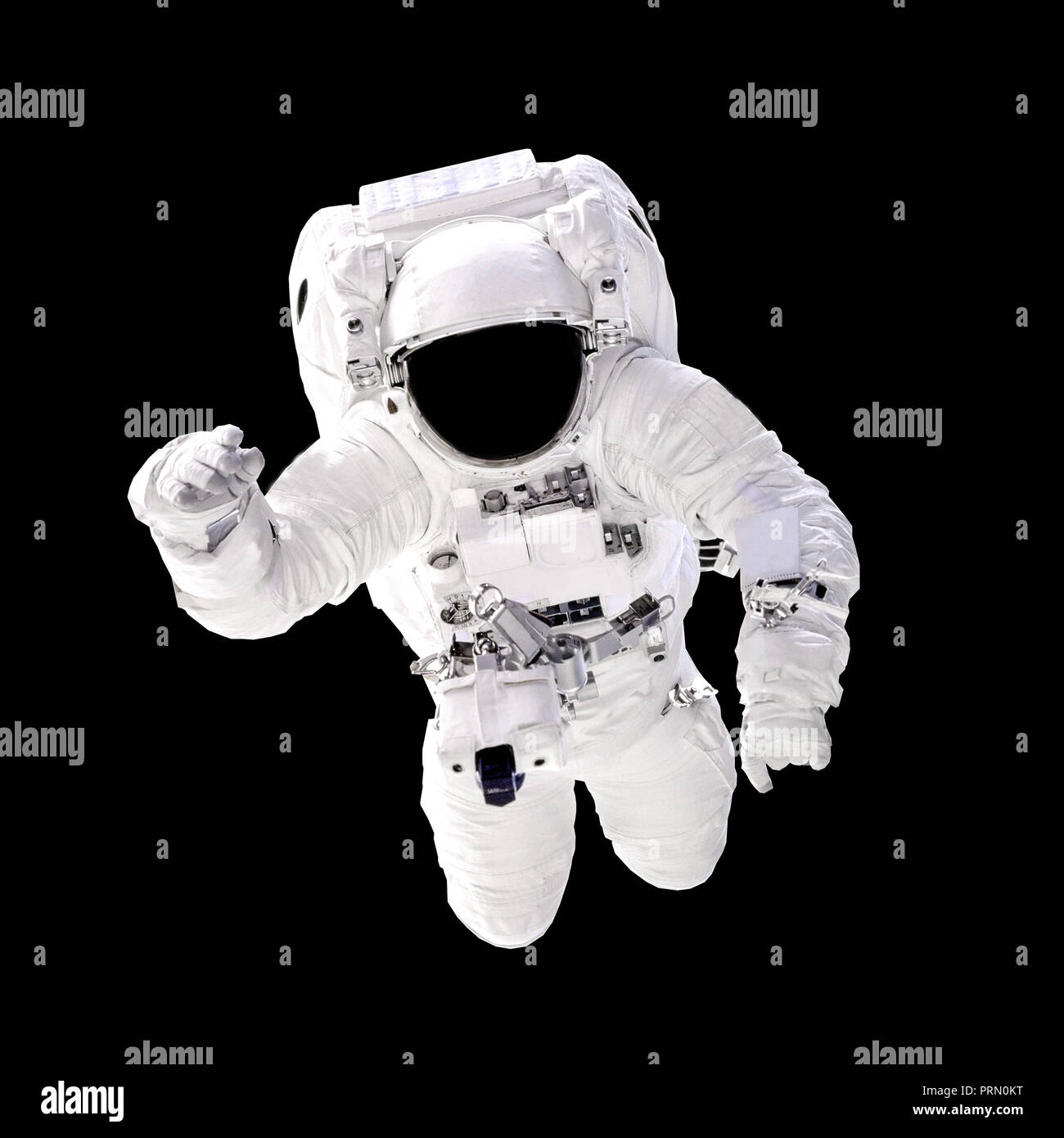 Astronaute en scaphandre close up isolé sur fond noir. Spaceman dans l'espace. Éléments de cette image fournie par la NASA Banque D'Images