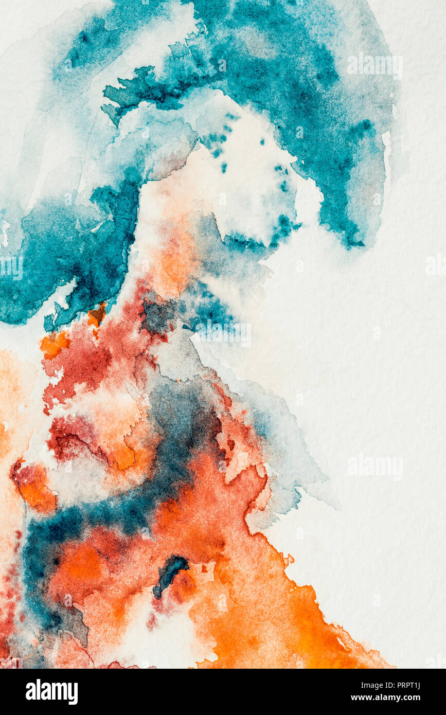 La peinture abstraite avec des peintures à l'orange et vert sur fond blanc Banque D'Images