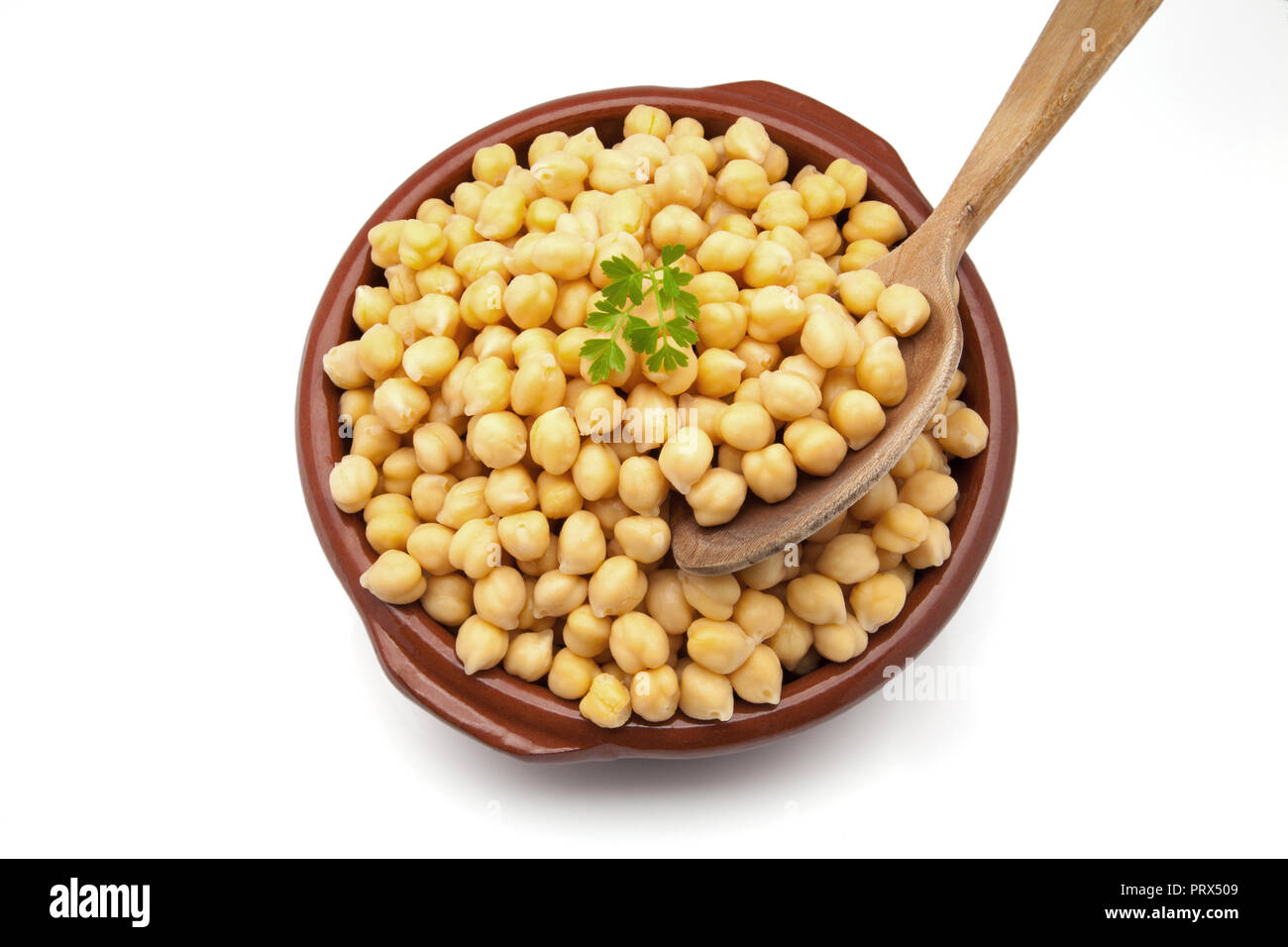 Des pois chiches cuits dans une casserole de boue Banque D'Images