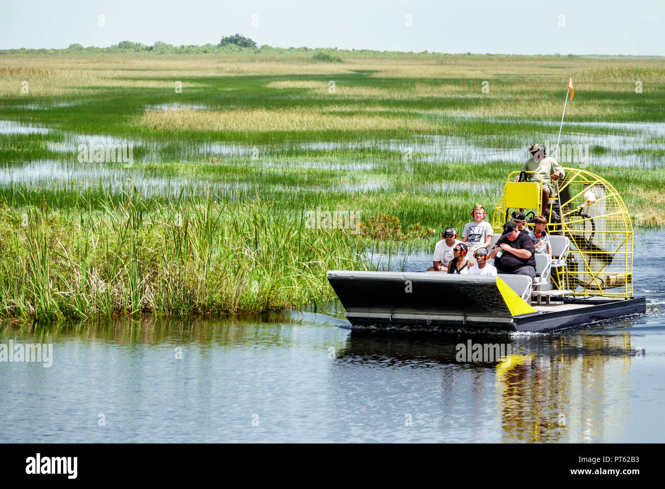 Miami Florida, Parc national des Everglades, pilotes d'hydroglisseur, Black Blacks Africains ethnie minoritaire, famille parents parents enfants childre Banque D'Images