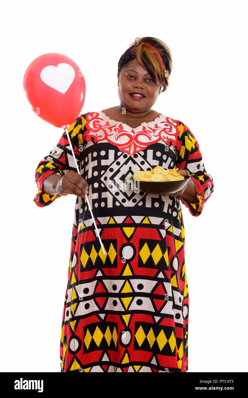 Heureux réfléchis noir gras African woman kissing wh Banque D'Images