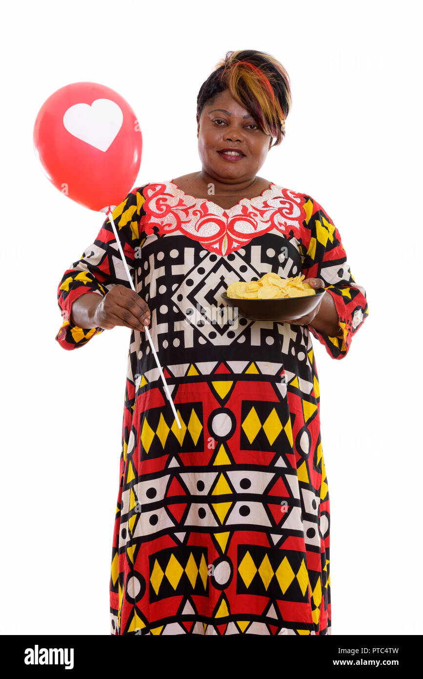 Happy fat black African woman kissing en maintenant Banque D'Images