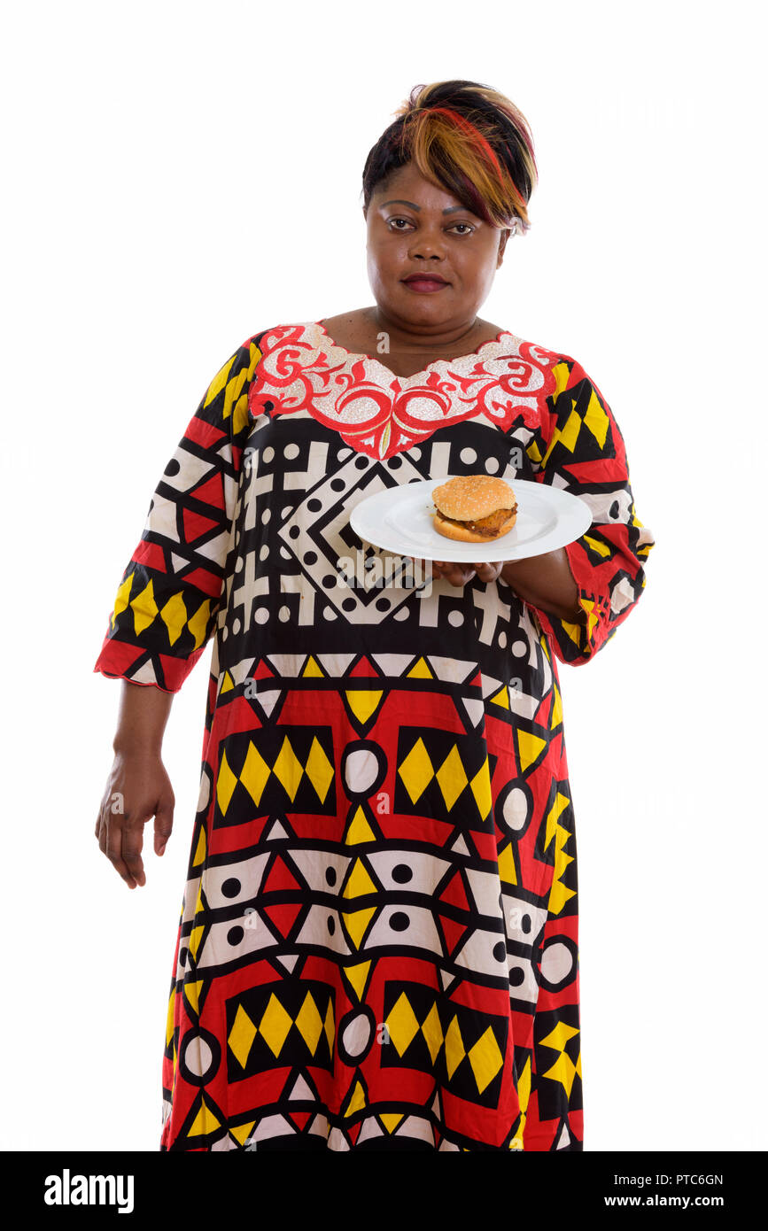 Portrait de femme africaine noire gras tout en maintenant l'article bu Banque D'Images