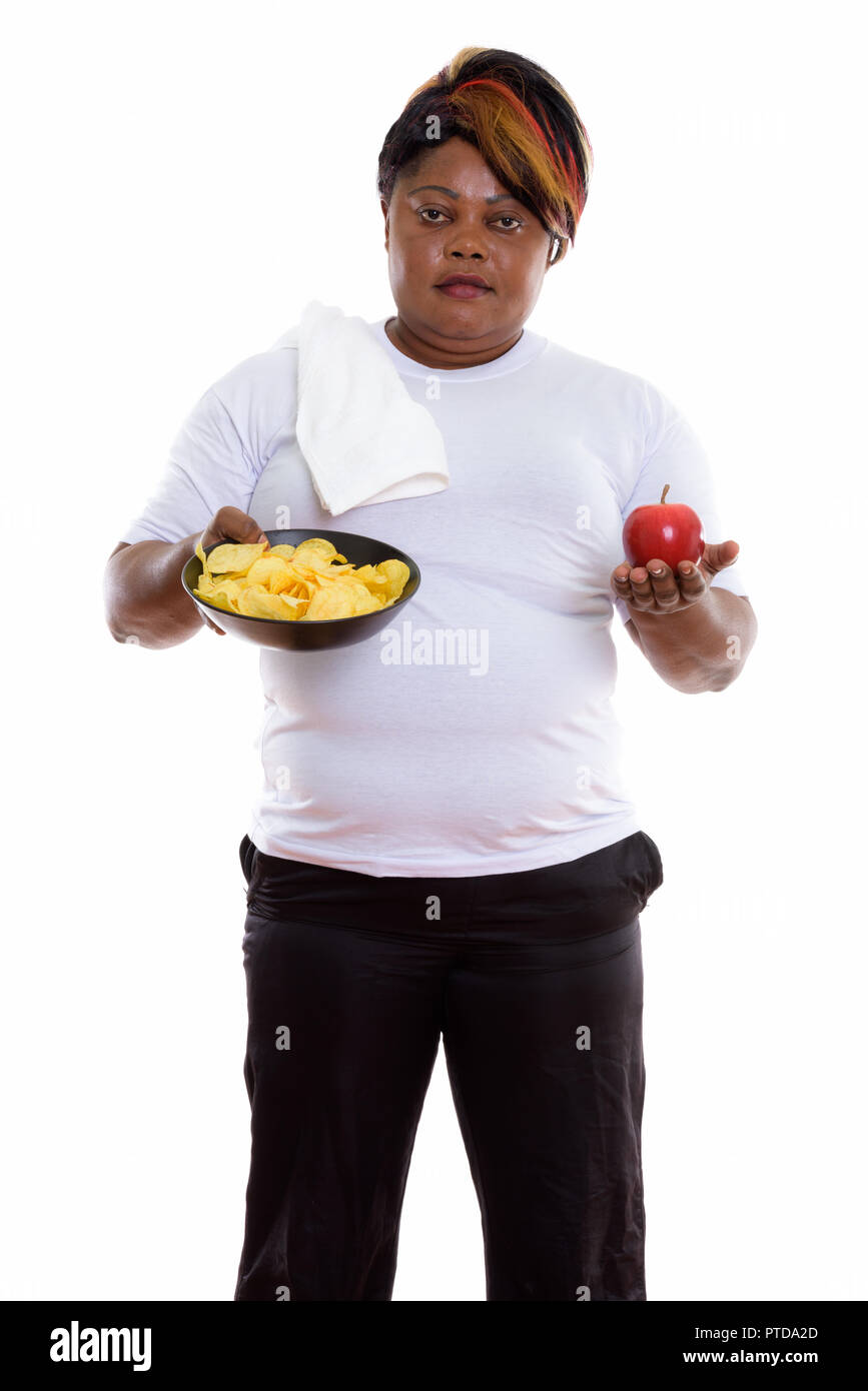 Portrait de femme africaine noire gras tout en maintenant l'article bo Banque D'Images