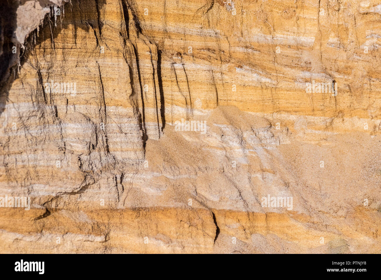 Image d'un contexte naturel des sols argileux couper au large de la côte Banque D'Images