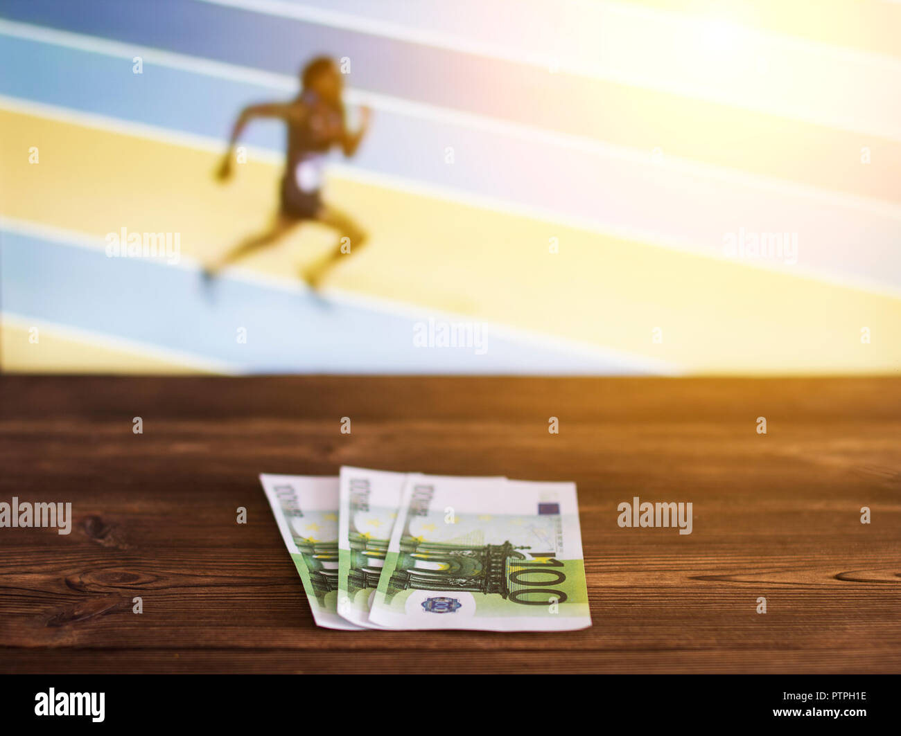 Euro argent sur l'arrière-plan de la TV sur qui montrent l'athlétisme, le  jogging, les paris sportifs, euro Photo Stock - Alamy
