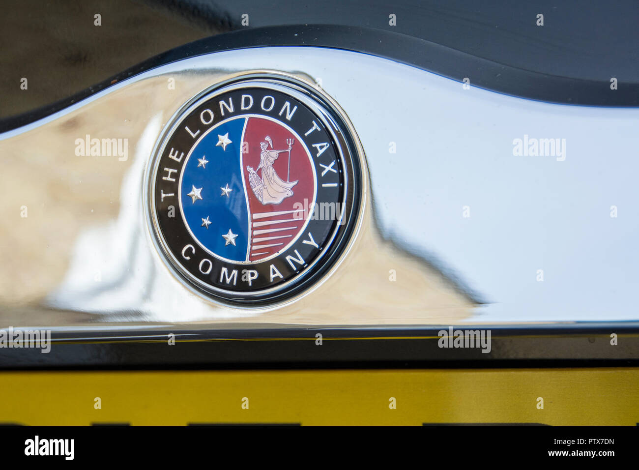 Gros plan sur un logo et un badge de London taxi Company Banque D'Images