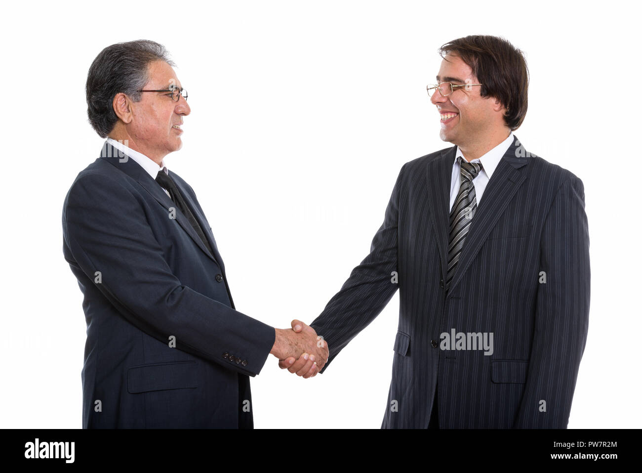Voir le profil de professionnels jeunes et senior businessman smili persan Banque D'Images