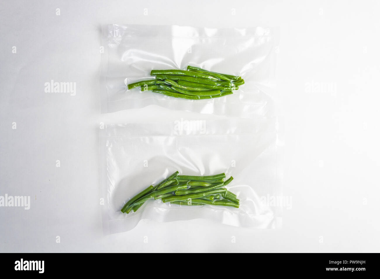 Haricots verts frais scellés sous vide Photo Stock - Alamy