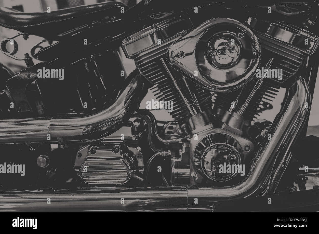 La photographie d'art en noir et blanc vintage de ton moteur moto du broyeur. Banque D'Images