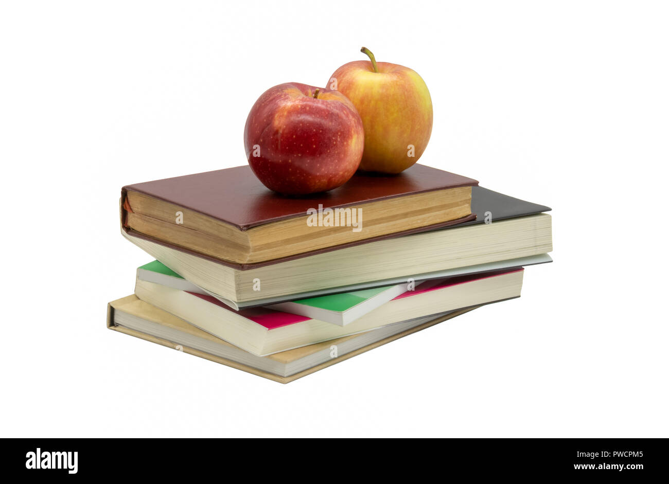 Une vue de l'éducation de deux pommes sur peu de livres Banque D'Images