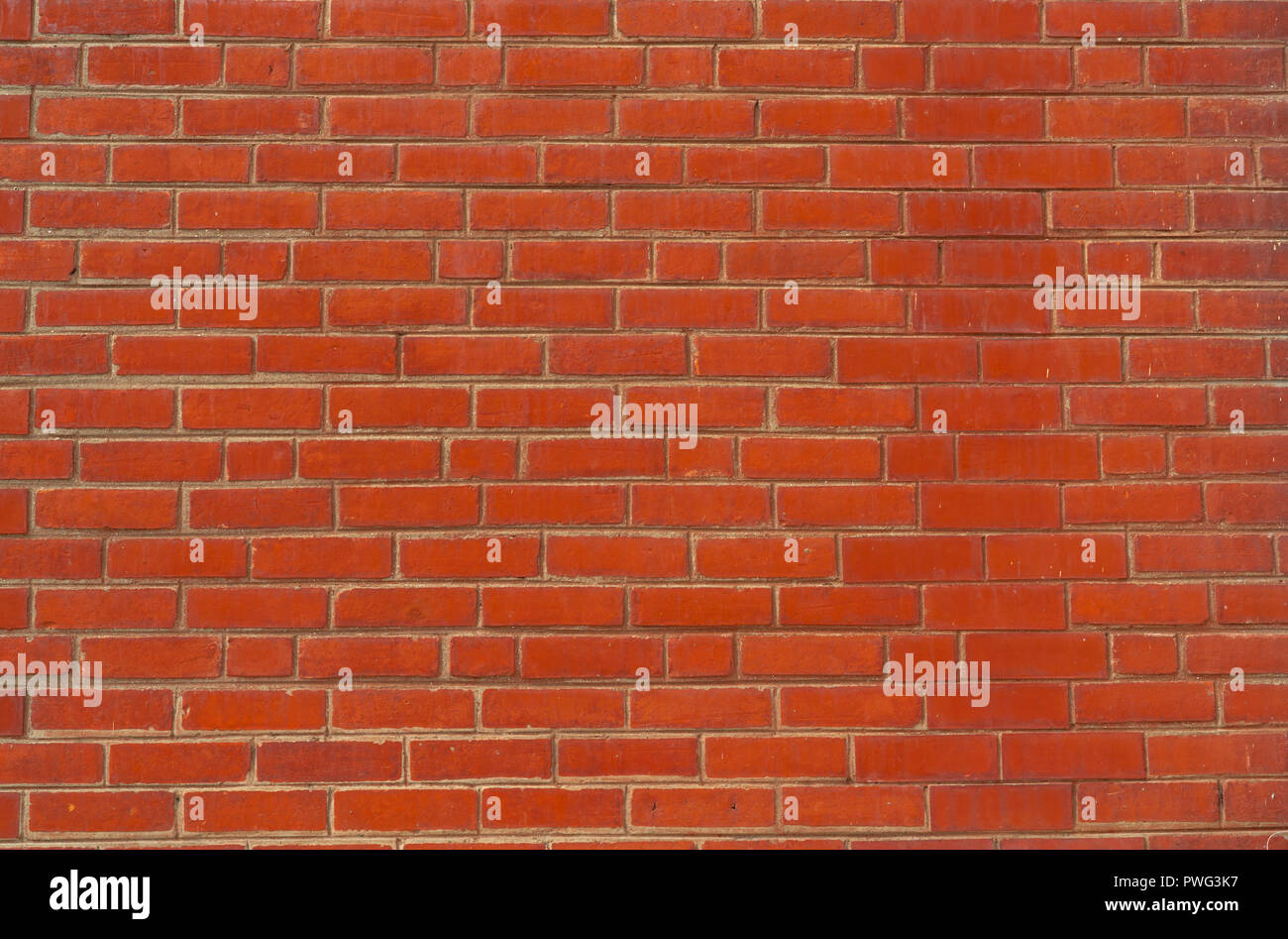 Mur de brique Orange texture background. Arrière-plan de texte. Architecture extérieure concept. Banque D'Images