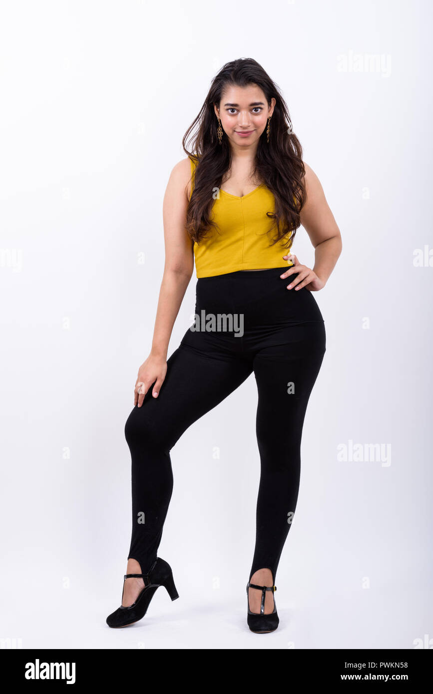 Full body shot of young beautiful Indian woman posing Banque D'Images