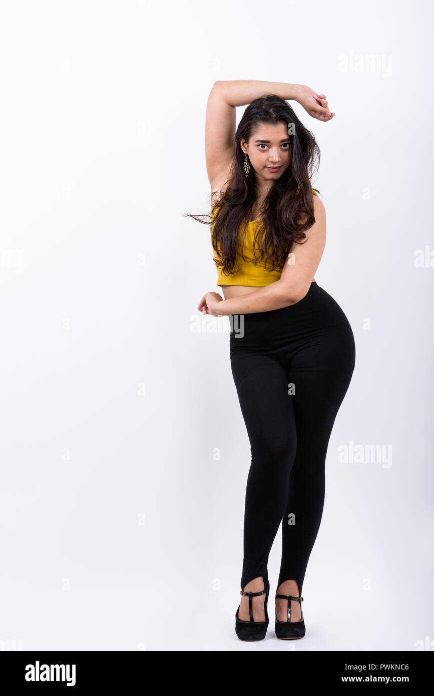 Full body shot of young beautiful Indian woman posing Banque D'Images
