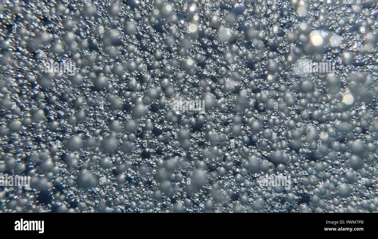 Gros plan de bulles d'air prises sous l'eau symbolisant l'essence de la vie et de l'univers. Un grand fond d'utiliser pour la science et de la technologie t Banque D'Images