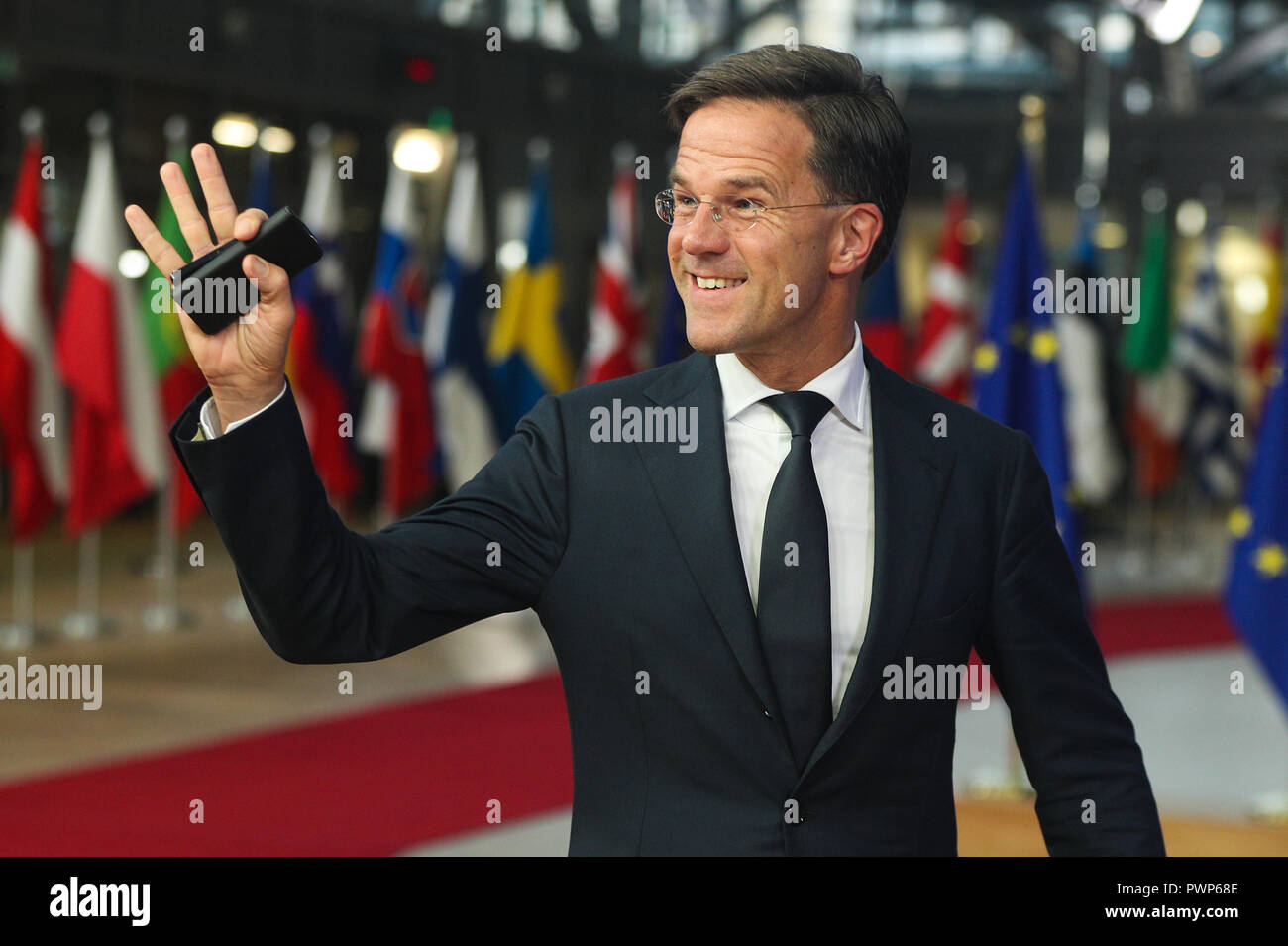 Bruxelles, Belgique. 17 Oct, 2018. Le Premier ministre néerlandais Mark Rutte arrive au Conseil européen à Bruxelles, Belgique, Octobre 17, 2018. L'état actuel de l'Brexit négociations sera la question clé au sommet de l'UE le mercredi soir. Le Premier ministre britannique Theresa May est prévu d'expliquer aux chefs d'Etat des 27 membres de l'UE comment elle envisage une solution pour les autres questions concernant Brexit. Credit : Zheng Huansong/Xinhua/Alamy Live News Banque D'Images