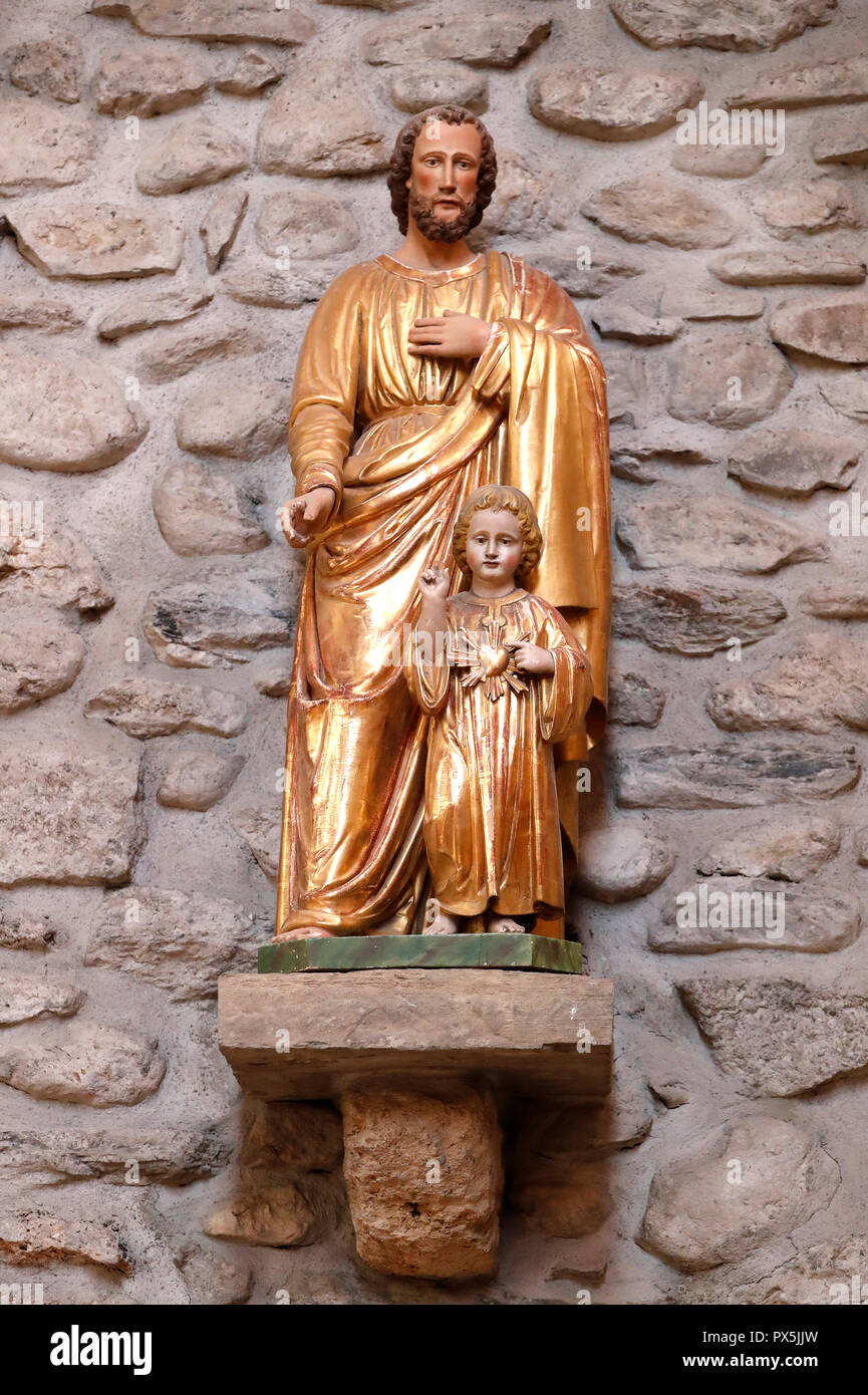 L'église Sainte Marie Madeleine. Saint Joseph et l'Enfant Jésus. Praz sur Arly. La France. Banque D'Images