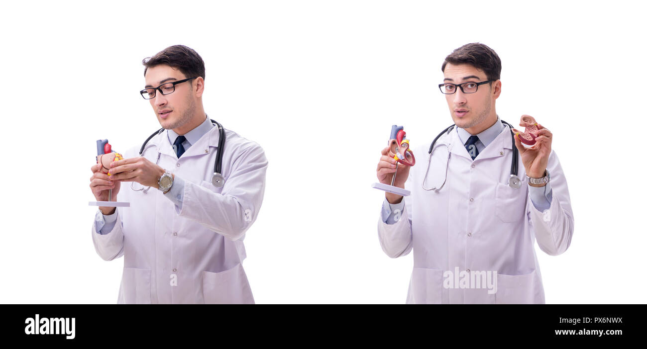 Jeune médecin avec forme de coeur isolated on white Banque D'Images