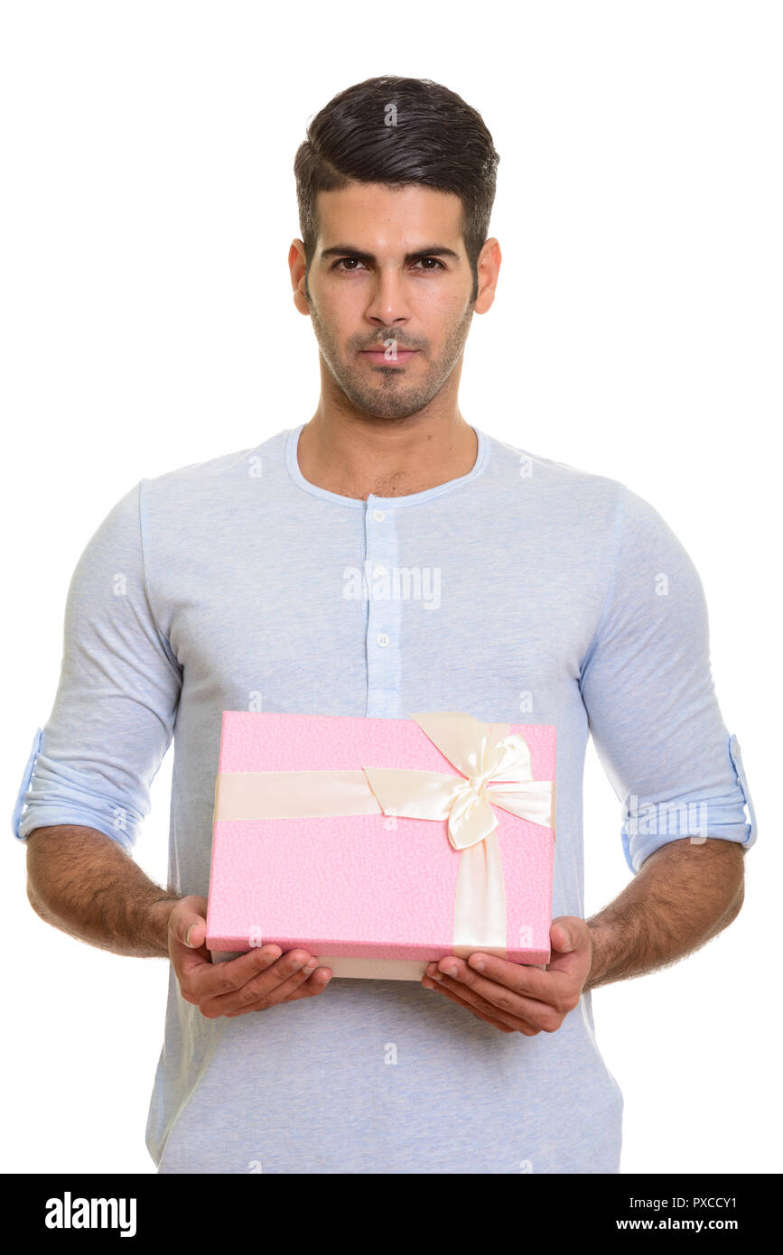 Beau jeune homme persan holding gift box Banque D'Images