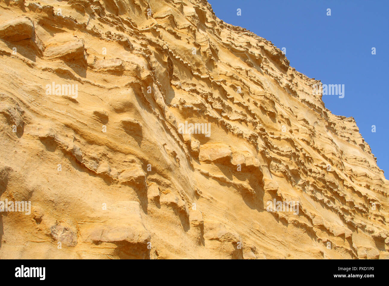 Falaises de Burton Bradstock beach, Dorset, Angleterre. Les rochers présents dans ces falaises : le Jurassique inférieur et l'Oolite Bridport Sable. Banque D'Images