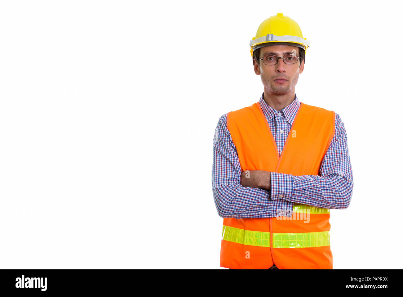 Studio shot of young handsome man construction worker wearing ey Banque D'Images