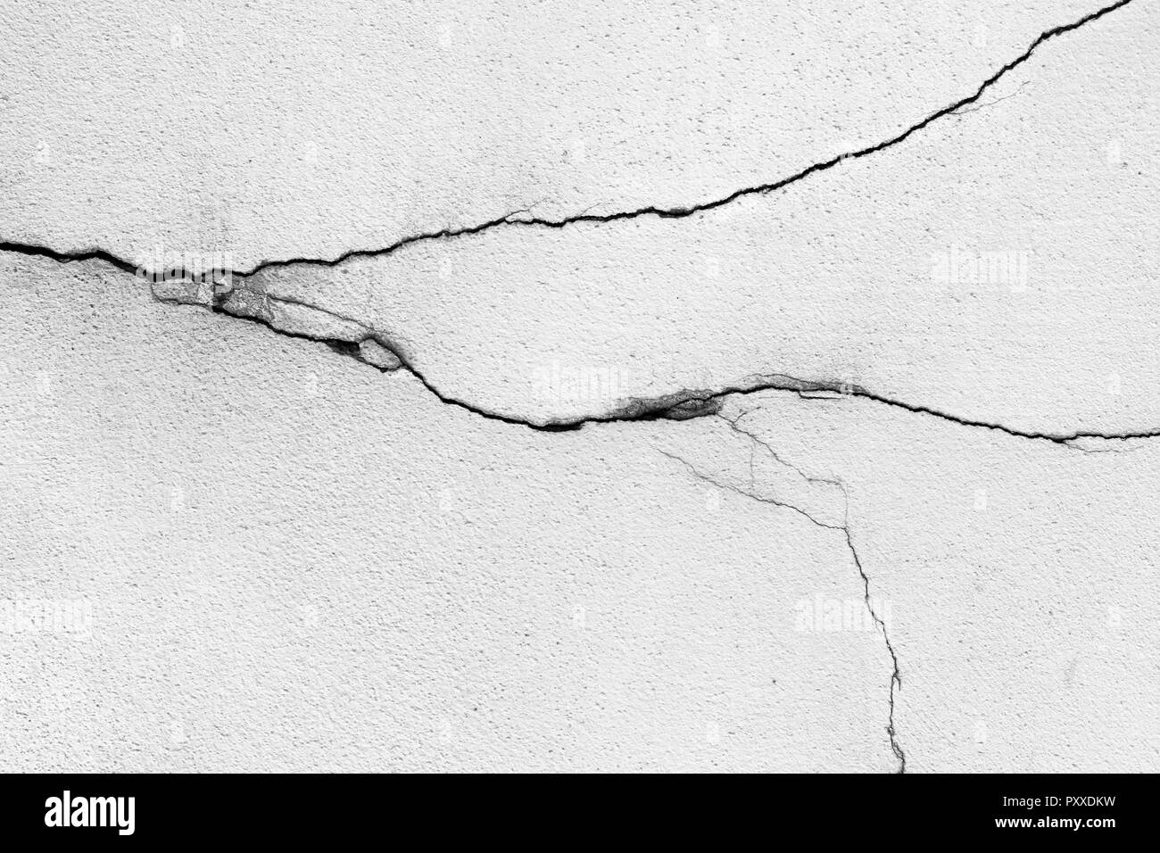 Des fissures sur le mur - Détail de la texture grunge - plâtre fissuré Banque D'Images