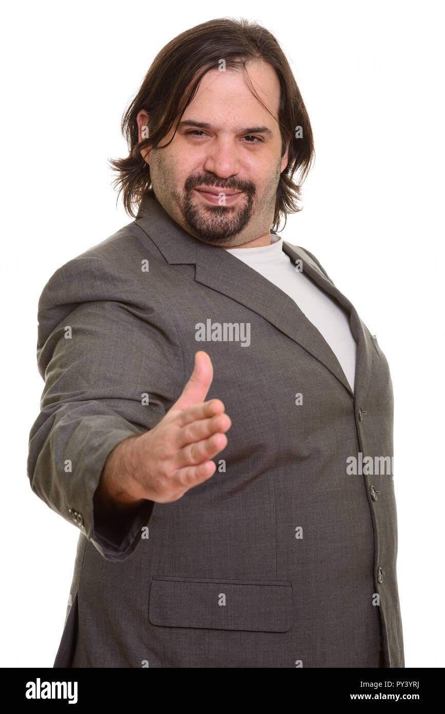 Happy fat Caucasian businessman smiling et poignée donnant Banque D'Images